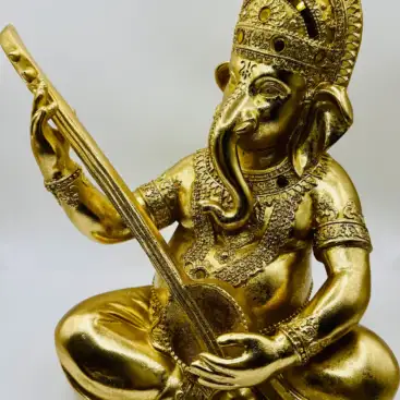 Figura Ganesha Con Guitarra Dorada